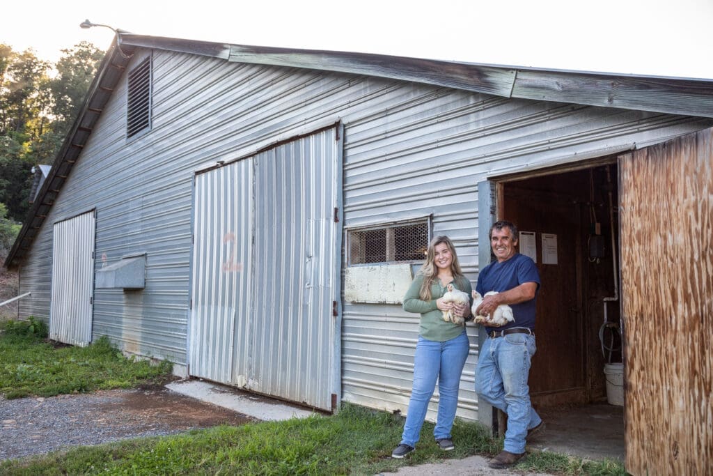 Farmer Focus Father, Daughter Farmers with chickens